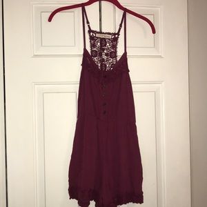Burgundy/maroon romper.